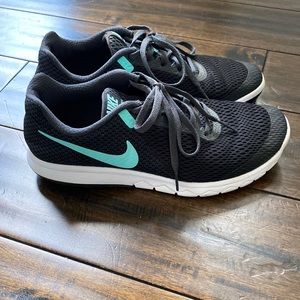 Tiffany blue and black Nike shoes